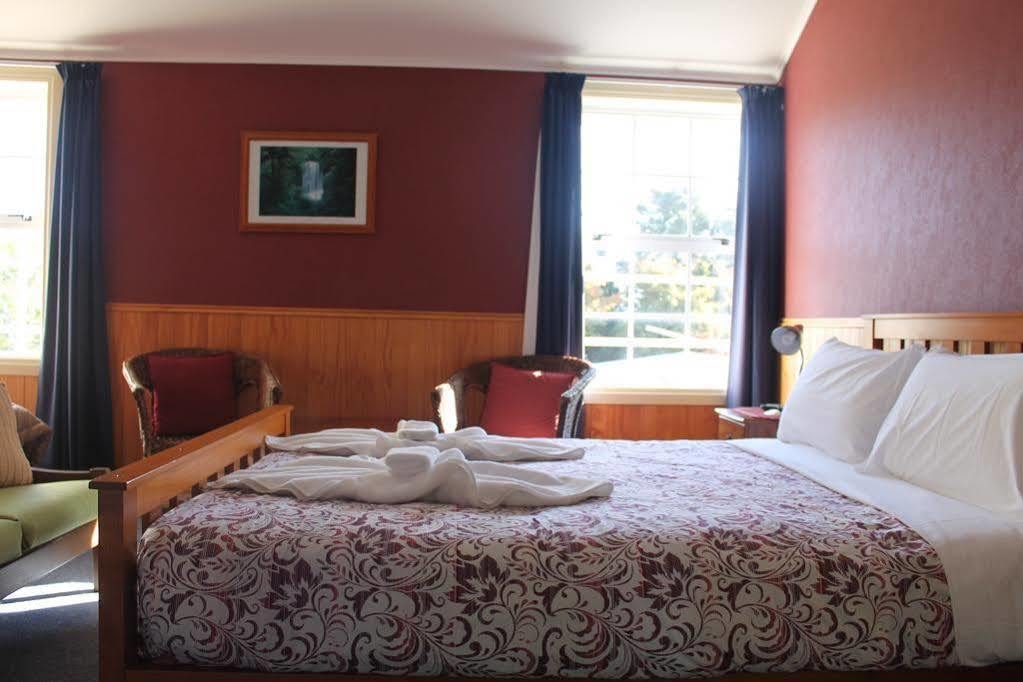 Stony River Hotel Okato Bagian luar foto