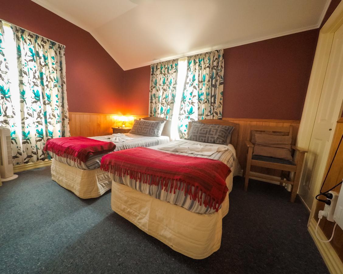 Stony River Hotel Okato Bagian luar foto